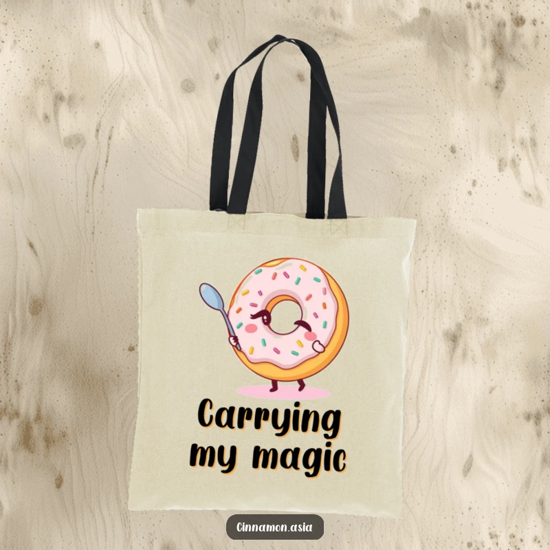 Funny tote bag depicting a winking donut with sprinkles, magically levitating a small spoon, great for carrying treasures.